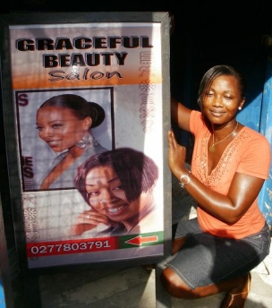 Gifty with her sign board |